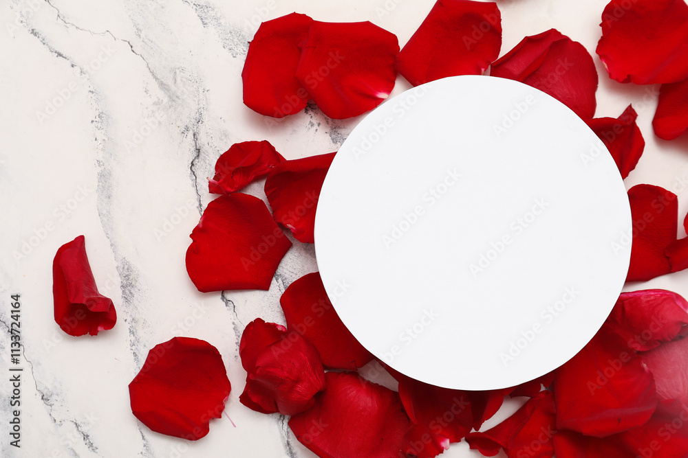 Blank card with beautiful red rose petals on white background Blank card with beautiful red rose petals on white background