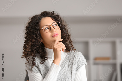 Thoughtful young woman look...
