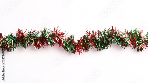 red and green shiny christmas tinsel garland on white background