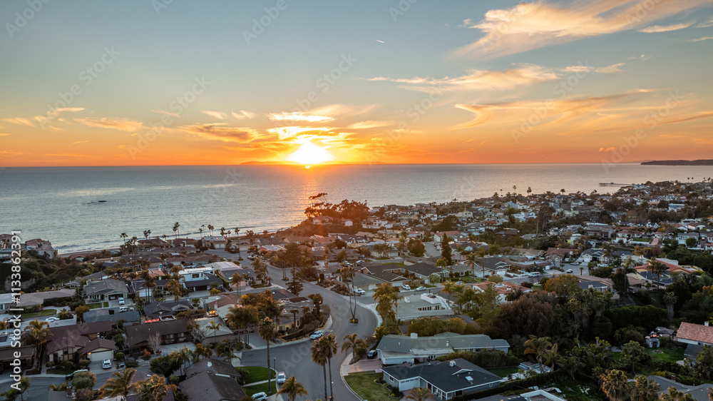 Aerial view of San Clemente coastline at sunset showcasing vibrant colors and serene coastal landscape Aerial view of San Clemente coastline at sunset showcasing vibrant colors and serene coastal landscape