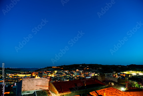 Pietraperzia, Sicily, Italy. Panorama of the city with roofs. Night photo