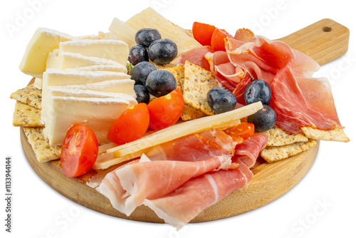 Charcuterie board. Wooden cutting board. Fruit and cheese platter. Cherry tomatoes and blueberries. Brie and parmesan cheese. Crackers and prosciutto. Sliced cheese and deli meat gourmet party snack. 