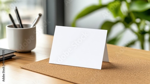 A blank card pinned to a corkboard in a cozy kitchen, awaiting heartfelt messages from loved ones. photo