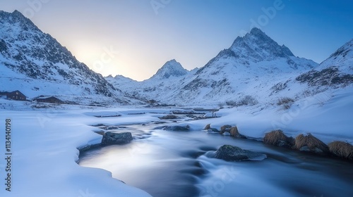 Serene winter landscape featuring snow-covered mountains and a flowing river at dusk.