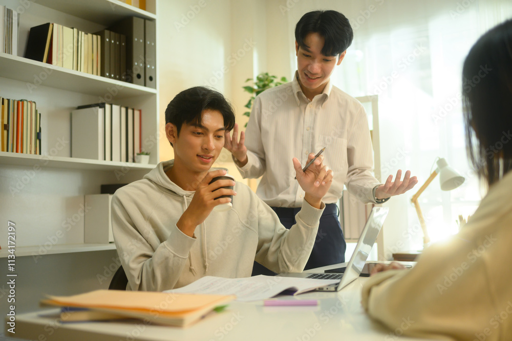 Tutor explaining topic and talking to students during a private lesson. Education and knowledge concept Tutor explaining topic and talking to students during a private lesson. Education and knowledge concept