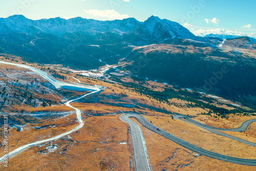 Obraz na płótnie Mountain landscape on a sunny autumn day. View of highway in Pyrenees mountains, Andorra, Europe w salonie
