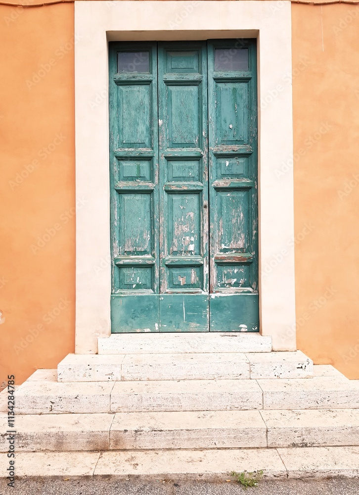 Fototapeta premium Old wooden door in the town of Rovinj, Croatia