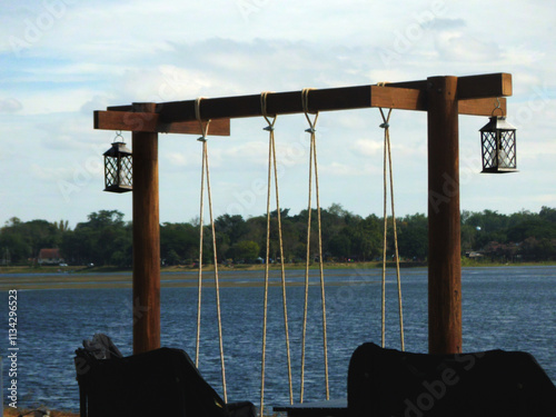 Swing with rope and wood Located along the dam.
