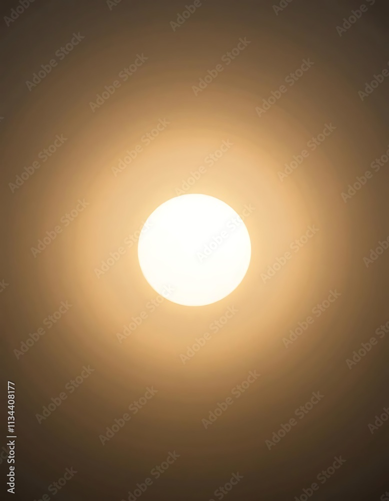 A glowing circular silhouette fading into a smooth gradient background A glowing circular silhouette fading into a smooth gradient background