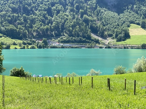 Lake Lungern or Natural reservoir Lungerersee - Canton of Obwald, Switzerland (Naturstausee Lungernsee oder Lungerensee - Kanton Obwald, Schweiz) photo