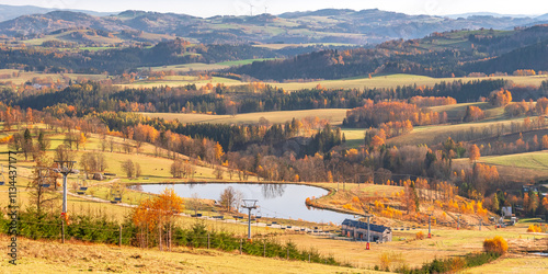 Obraz na płótnie Czech Republic, Stribrnice, view from the Stvanice peak on the mountain landscape with a reservoir. Autumn landscape in the evening. w salonie