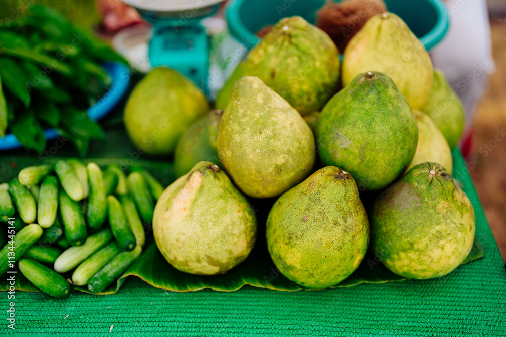 People in Asia eat organic vegetables and fruits, such as cucumbers and grapefruit, because they believe they are good for their health and can cure diseases, and reduce harmful agricultural practices People in Asia eat organic vegetables and fruits, such as cucumbers and grapefruit, because they believe they are good for their health and can cure diseases, and reduce harmful agricultural practices