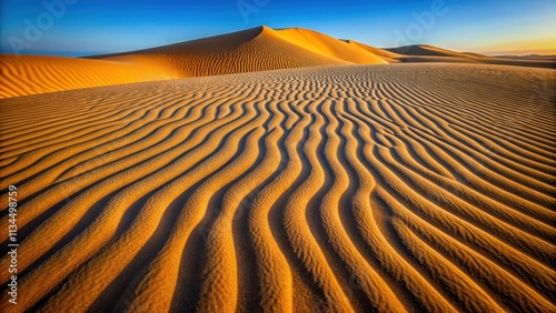 Windswept desert sand dunes with dramatic ripples and patterns , desert, sand, dunes, landscape, nature, arid, hot, dry