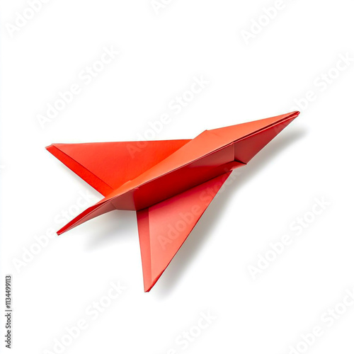 Red origami airplane isolated on white background. photo