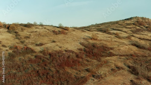 Aerial view of hills in the countryside in pale winter photo