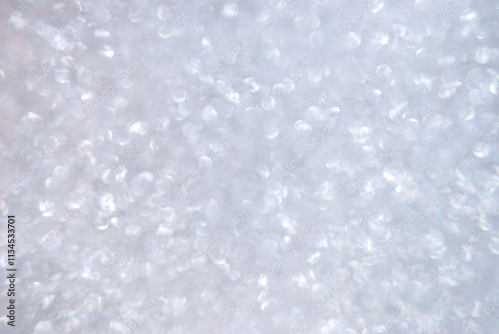 Soft silver sparkle bokeh effect background, silver sparkle lights or background Soft silver sparkle bokeh effect background, silver sparkle lights or background