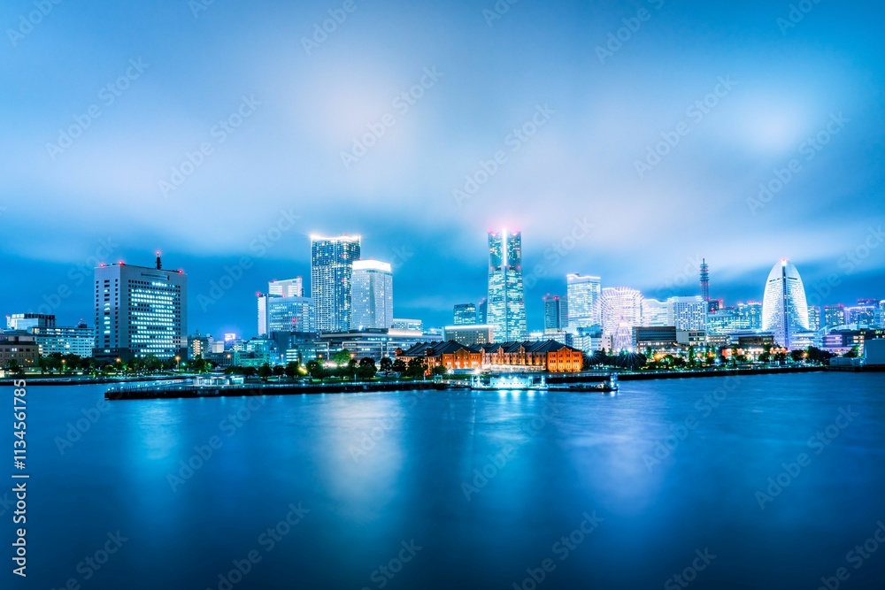 Yokohama skyline at night with illuminated skyscrapers. Yokohama skyline at night with illuminated skyscrapers.