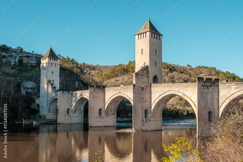 The 14th and 15th century Valentré bridge, a UNESCO World Heritage Site, crossing the Lot river in the town of Cahors in France The 14th and 15th century Valentré bridge, a UNESCO World Heritage Site, crossing the Lot river in the town of Cahors in France