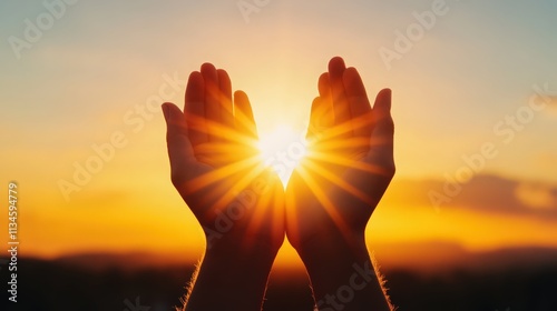 Two hands reaching up towards the sun