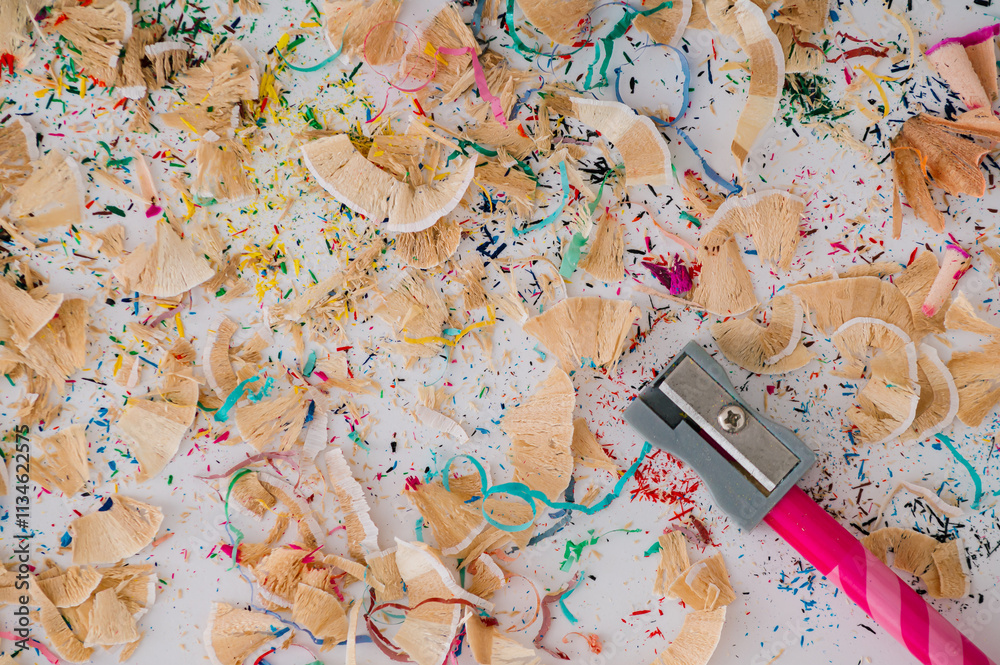 Image of sharpening coloured pencil. Creative school background idea. Aesthetic art concept. Colorful backdrop flat lay.