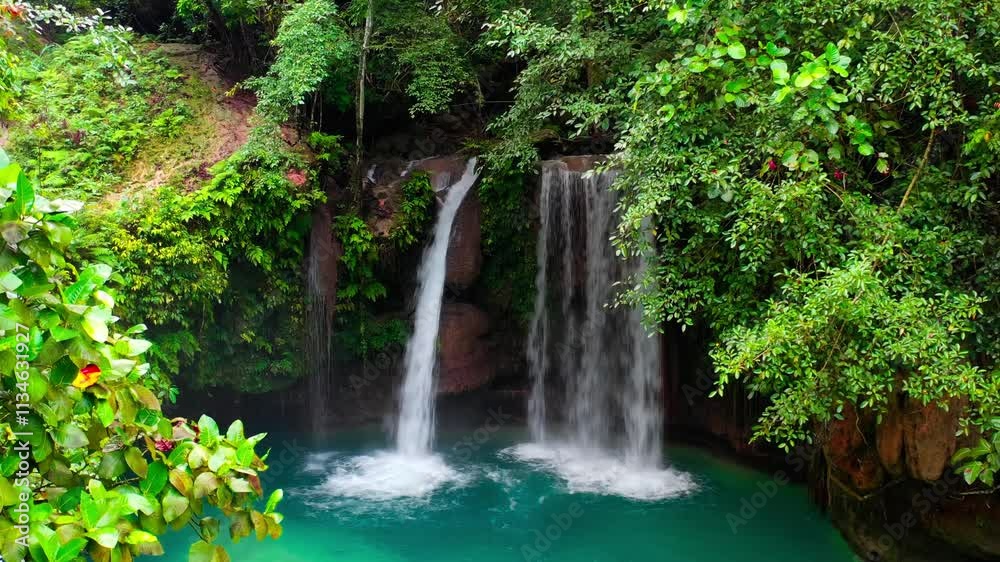 Aerial drone view Kawasan waterfalls in mountain gorge in the tropical jungle Philippines, Cebu. High quality 4k footage Aerial drone view Kawasan waterfalls in mountain gorge in the tropical jungle Philippines, Cebu. High quality 4k footage