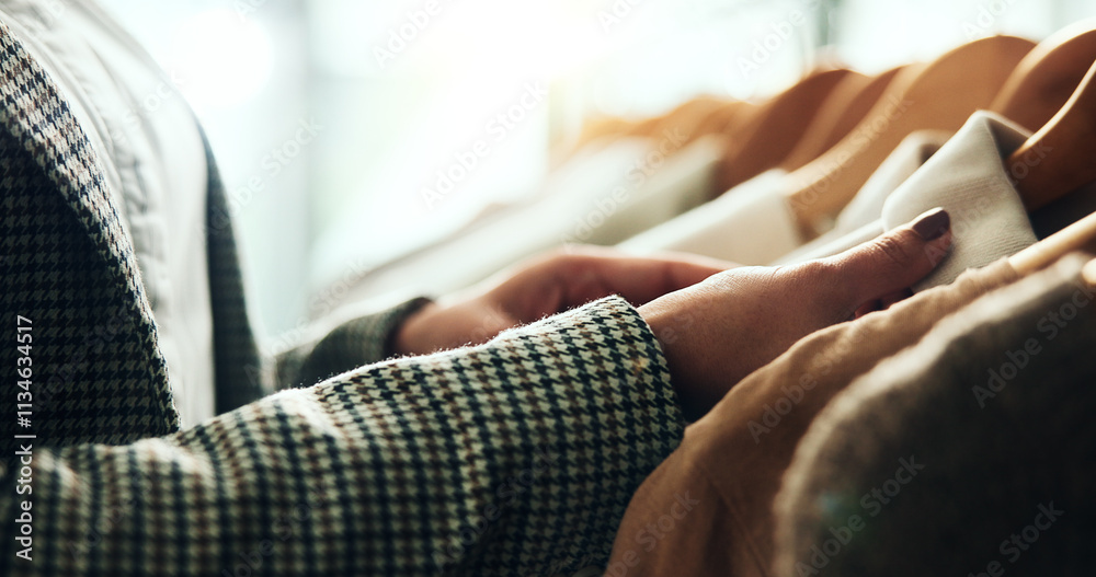 Fototapeta premium Shopping, retail and hands of woman with clothes on rack for sale, discount and store promotion. Fashion, boutique and customer with choice, decision and option for textile, fabric and clothing