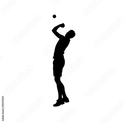 Silhouette of a man playing volleyball, jumping and spiking the ball
