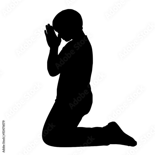 Silhouette of a person kneeling and praying.