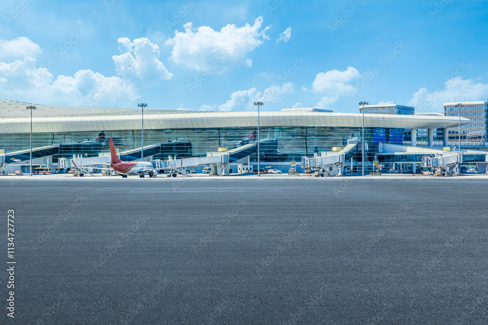 Empty road and terminal building in airport Empty road and terminal building in airport