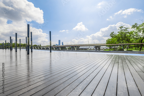 Empty wooden floor in the park and woods with bridge