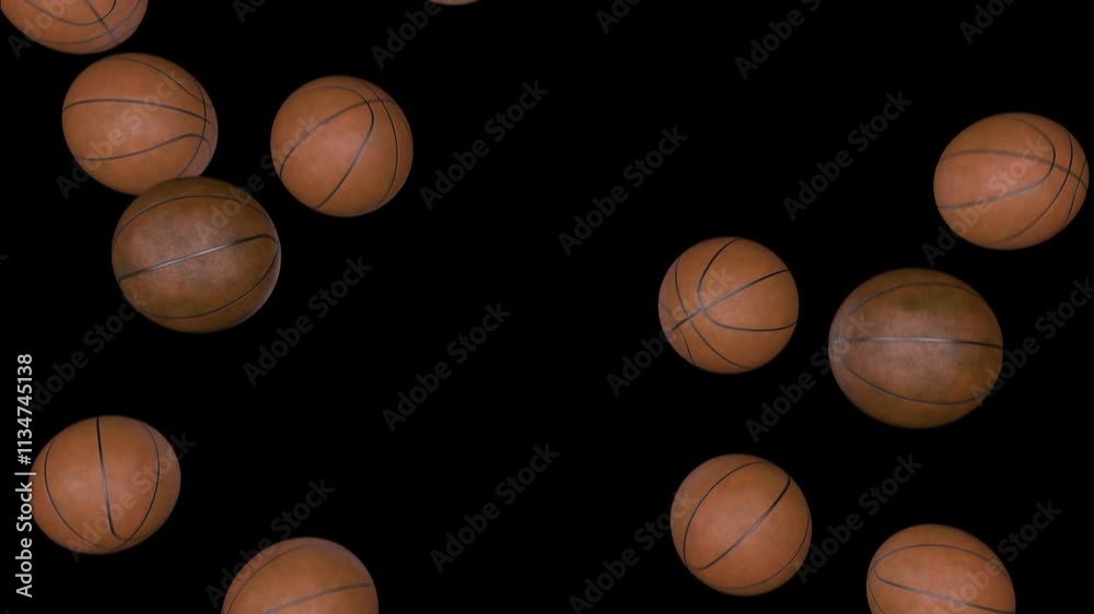 Basketballs falling on the black background Basketballs falling on the black background