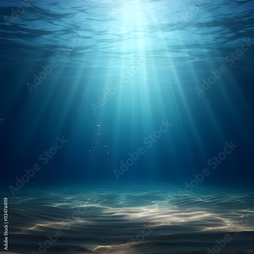 blue ocean bottom and sun rays underwater