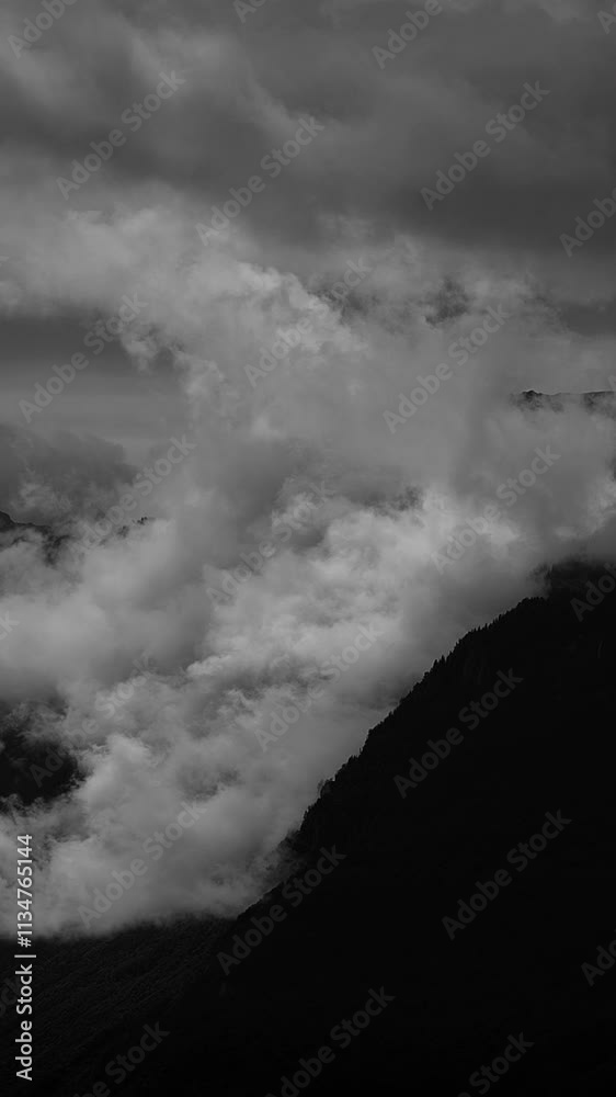 A Dramatic Mountain Landscape With Clouds Captured in Stunning Black and White Photography A Dramatic Mountain Landscape With Clouds Captured in Stunning Black and White Photography
