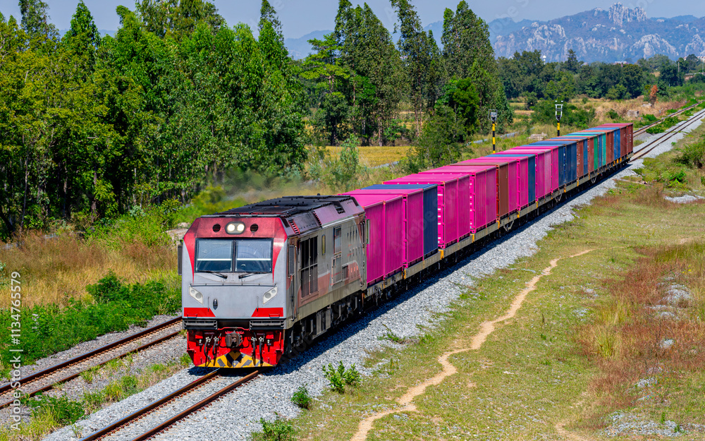 freight Container train num 552 at Saraburi, Thailand freight Container train num 552 at Saraburi, Thailand