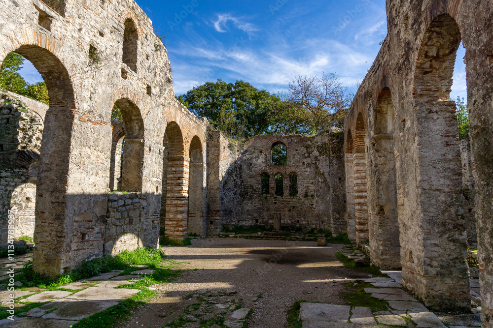 The ancient stone ruins of the Great Basilica of Butrint National Park in Albania The ancient stone ruins of the Great Basilica of Butrint National Park in Albania