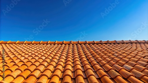 Wallpaper Mural Sunlit terracotta roof tiles under clear blue sky, sunlit, terracotta, roof tiles, clear blue sky, sunlight Torontodigital.ca