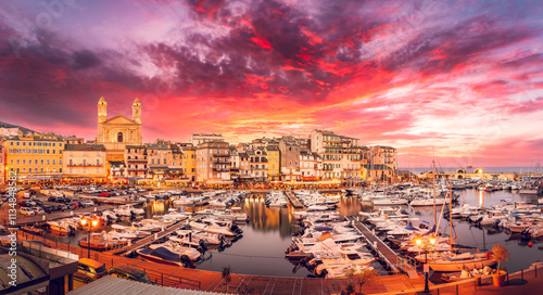 Obraz na płótnie Vibrant marina of Bastia, Corsica, featuring a picturesque harbor, Mediterranean architecture, and a stunning sunset over luxury yachts. w salonie