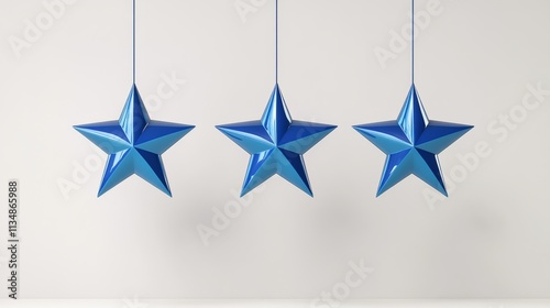 Three blue stars hanging from a string. The stars are blue and are hanging from a white background