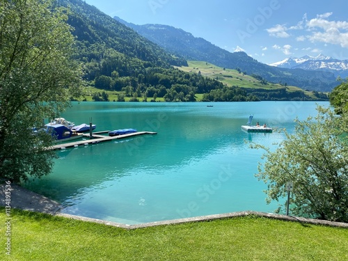 Lake bad Bürglen or Seebad Burglen Beach - Canton of Obwald, Switzerland (Seebad Bürglen oder Seebadi am Lungerersee mit Strand - Kanton Obwald, Schweiz) photo