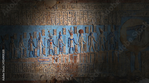 Hieroglyphic carvings and paintings on wall photo