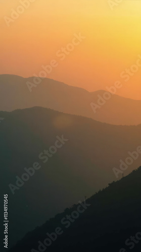 Rolling Hills at Golden Hour with Warm Light and Subtle Mist