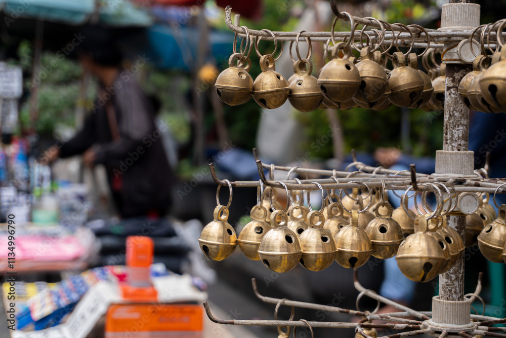 Obraz premium Small bells for sale at traditional market, Selective focus