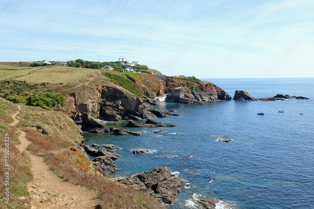 Lizard point on the South West Coast Path, the most southerly point in the UK, on the Lizard Peninsula, Cornwall. Lizard point on the South West Coast Path, the most southerly point in the UK, on the Lizard Peninsula, Cornwall.