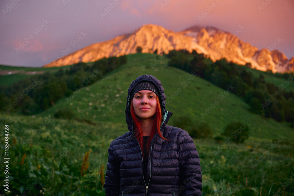 portrait of a young girl against the background of mountains during sunset on a hike portrait of a young girl against the background of mountains during sunset on a hike