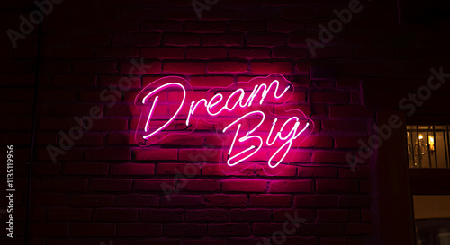 A neon pink sign saying 