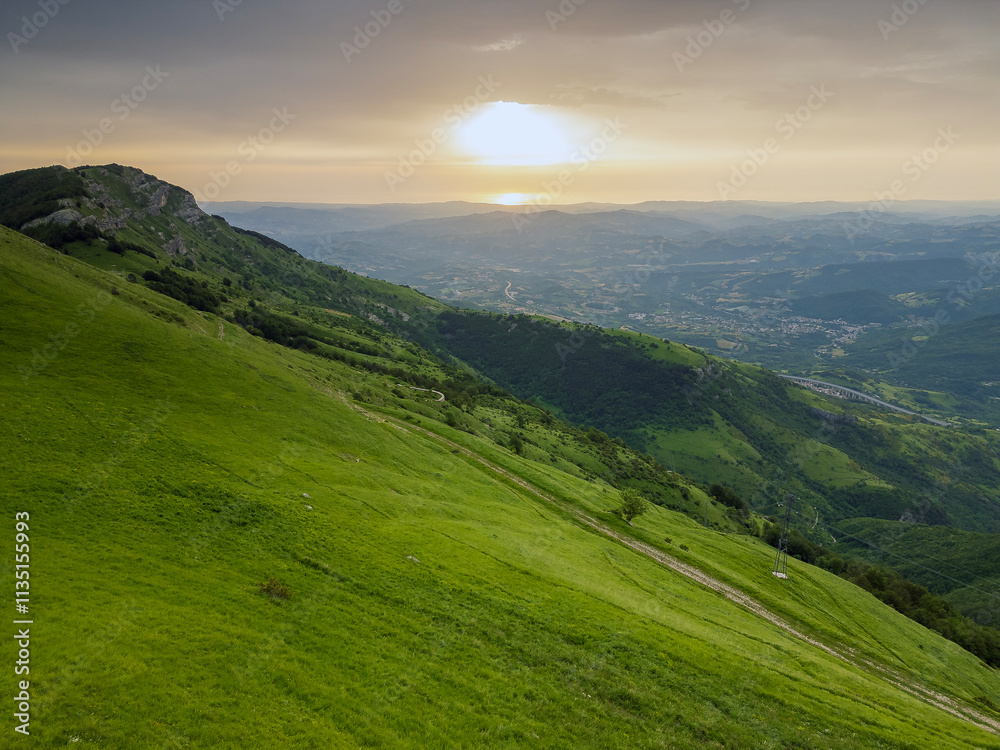 Aerial view at dawn of the Gran Sasso peak in Abruzzo. The sun rising over the Adriatic Sea