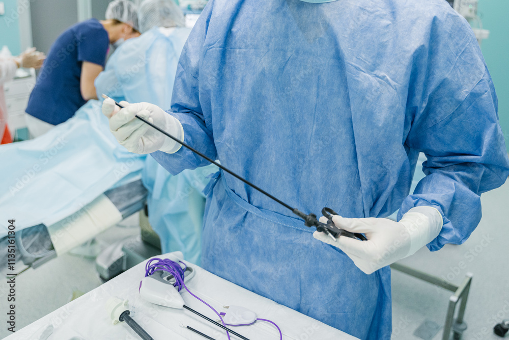 A skilled medical professional precisely prepares essential surgical instruments in a controlled operating room setting,