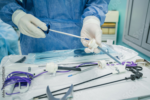 A skilled medical professional precisely prepares essential surgical instruments in a controlled operating room setting,