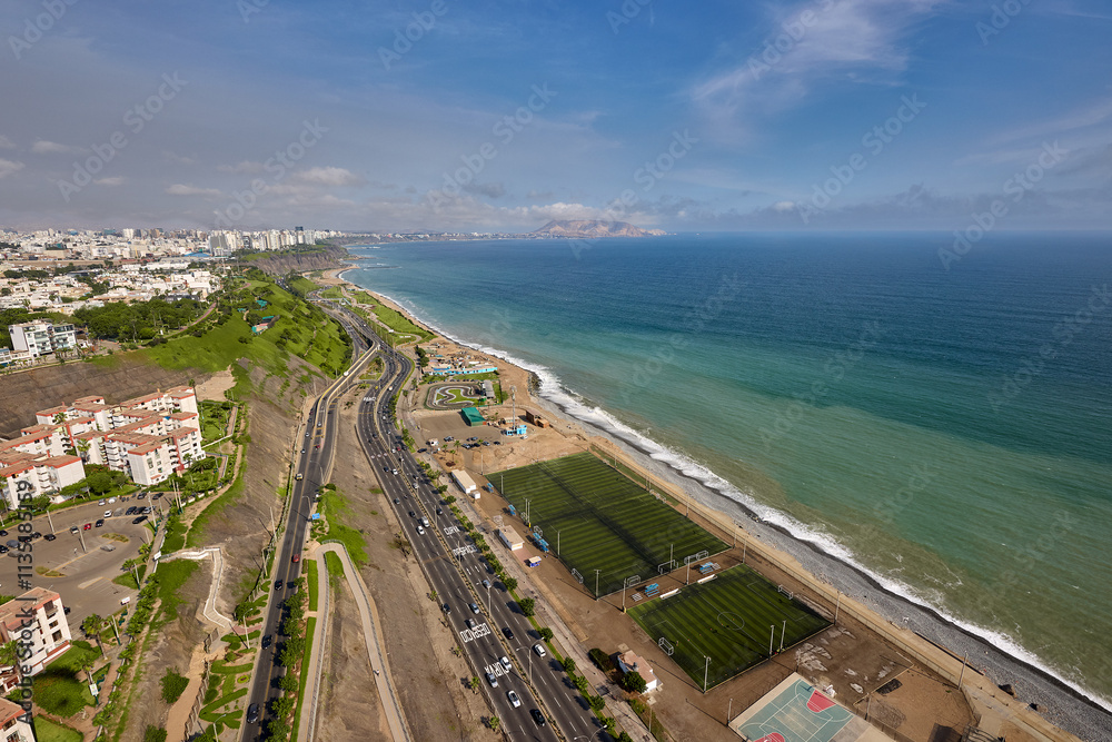 An aerial view of Lima’s Costa Verde reveals the perfect blend of urban life and natural beauty.With cliffs that kiss the Pacific and waves that call to surfers, this coastline is pure magic. An aerial view of Lima’s Costa Verde reveals the perfect blend of urban life and natural beauty.With cliffs that kiss the Pacific and waves that call to surfers, this coastline is pure magic.