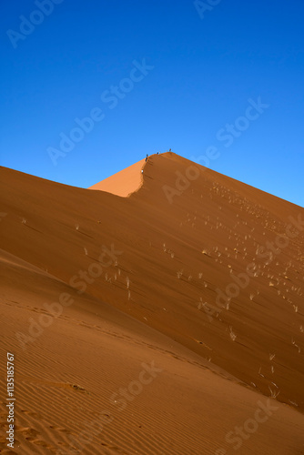 The ridge to reach the summit of Big Daddy with long sandy slopes in Sossusvlei, Namibia
